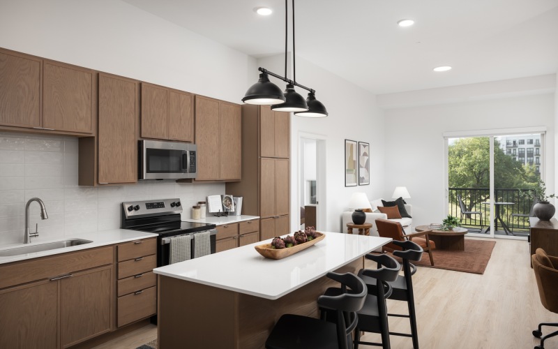 a kitchen with wood cabinets
