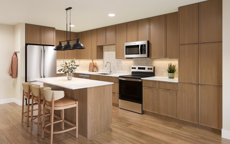 a kitchen with wood cabinets
